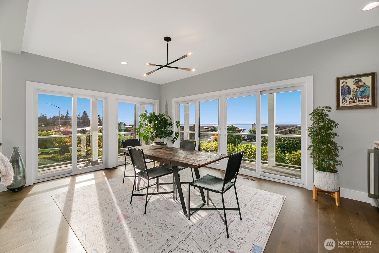6625 136th Place Southwest Edmonds, WA 98026 - Photo 16 of 40 a view of a dining room with furniture window and wooden floor