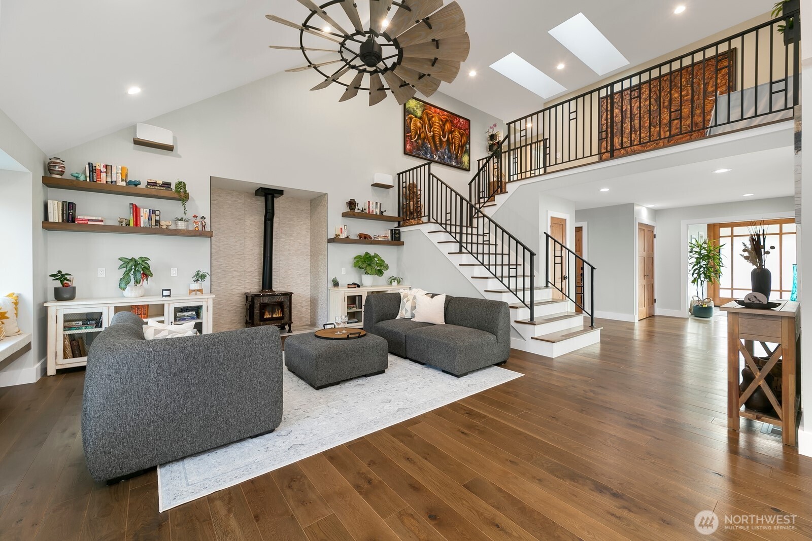 6625 136th Place Southwest Edmonds, WA 98026 - Photo 19 of 40 a living room with furniture and wooden floor