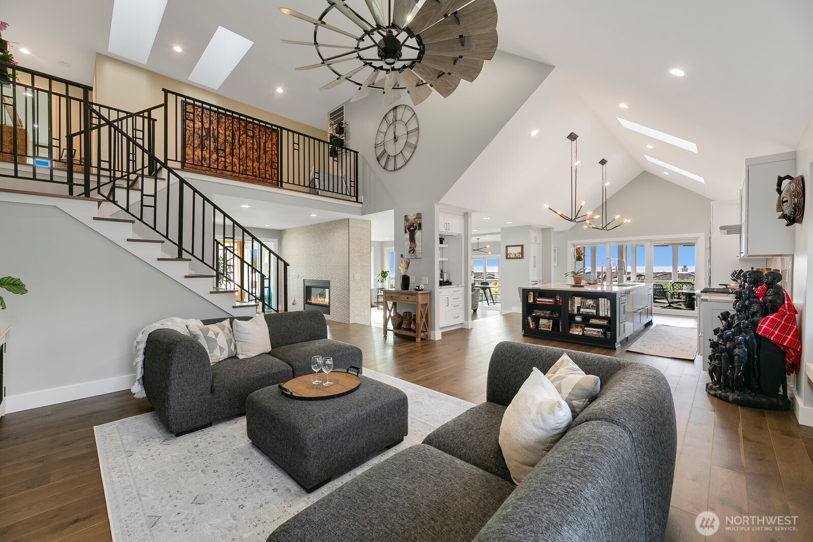 6625 136th Place Southwest Edmonds, WA 98026 - Photo 20 of 40 a living room with furniture kitchen view and a chandelier