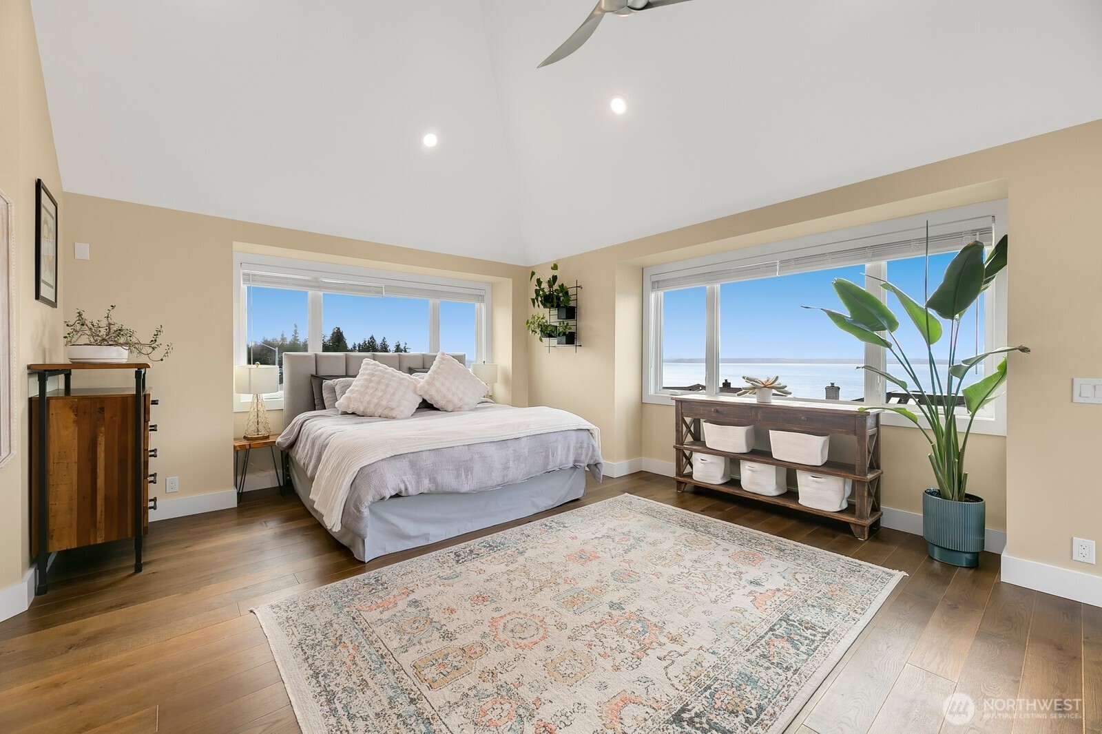 6625 136th Place Southwest Edmonds, WA 98026 - Photo 23 of 40 a bedroom with a bed and a potted plant on the dresser