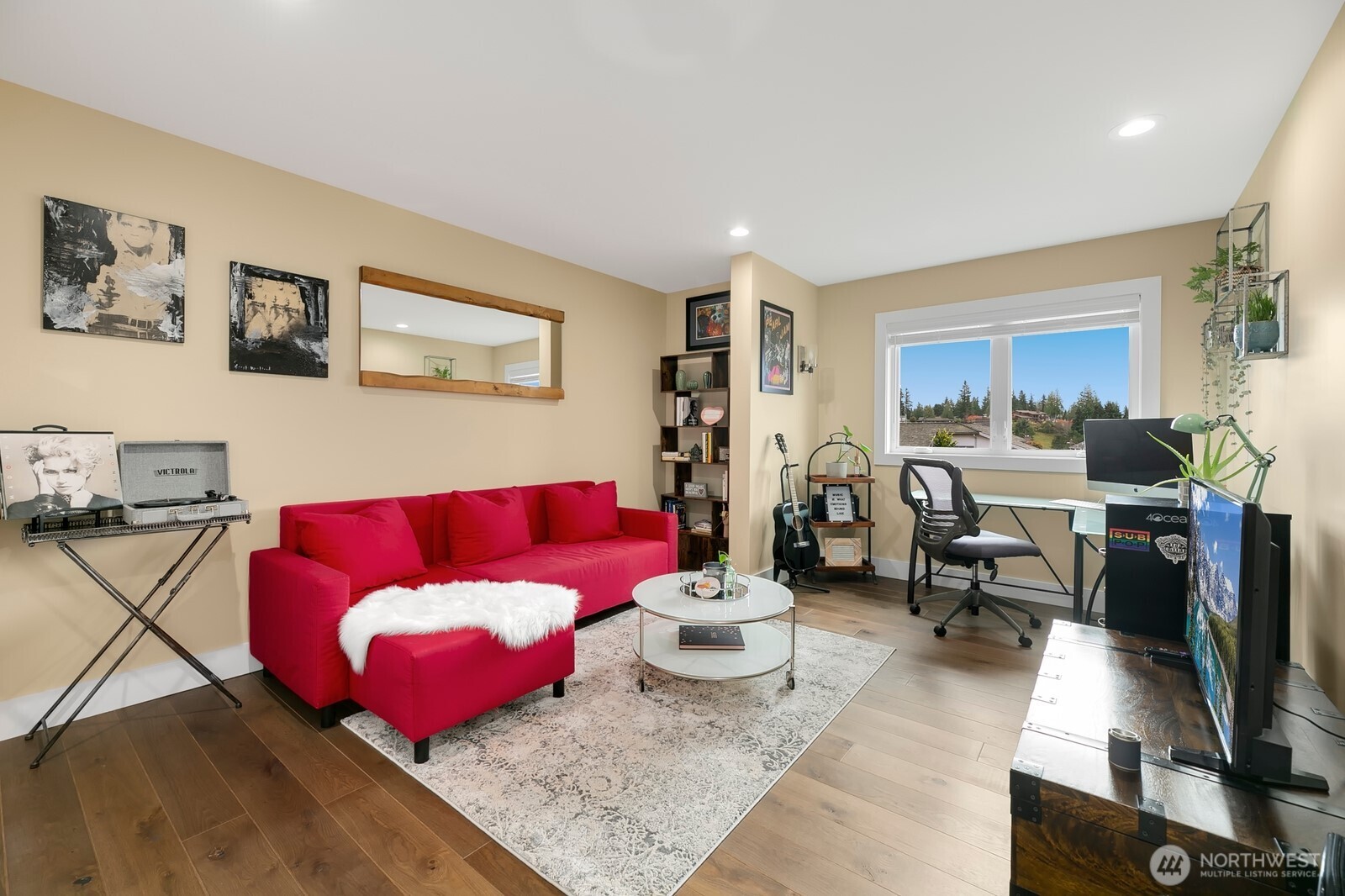 6625 136th Place Southwest Edmonds, WA 98026 - Photo 33 of 40 a living room with furniture and a flat screen tv