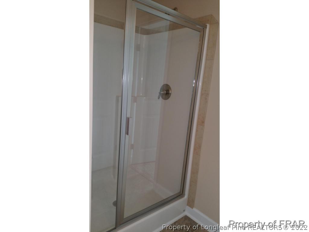 157 Shellbark Drive Spring Lake, NC 28390 - Photo 13 of 17 a bathroom with a shower