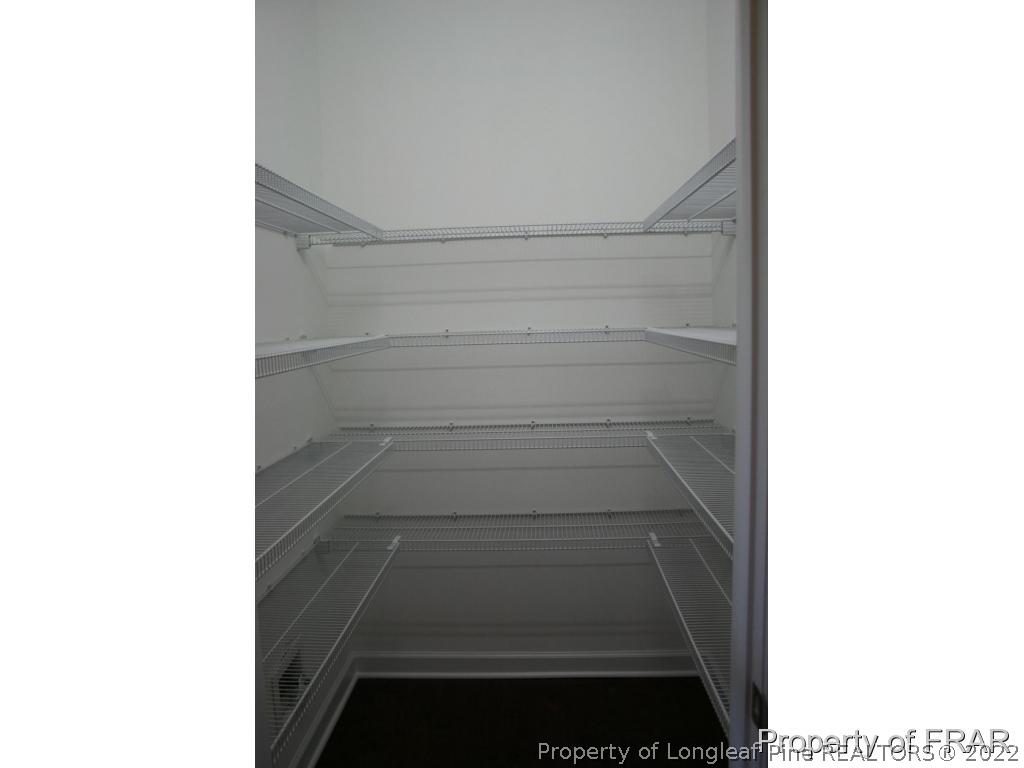 157 Shellbark Drive Spring Lake, NC 28390 - Photo 4 of 17 a black and white photo of a house