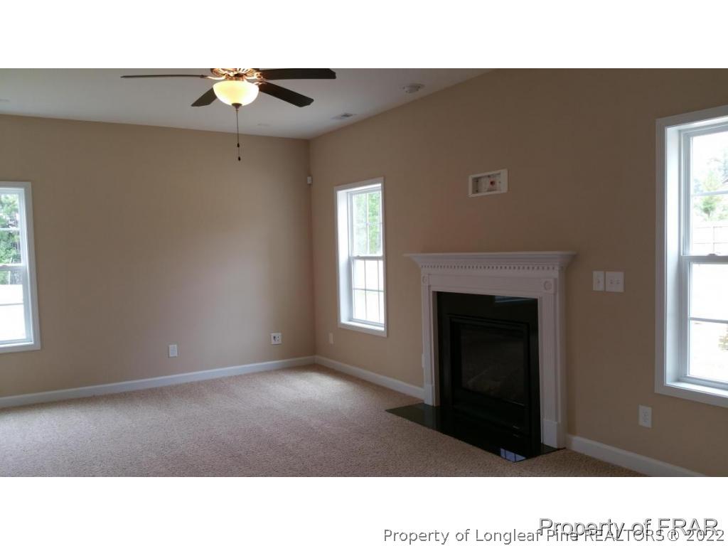 157 Shellbark Drive Spring Lake, NC 28390 - Photo 6 of 17 a black and white photo of a livingroom