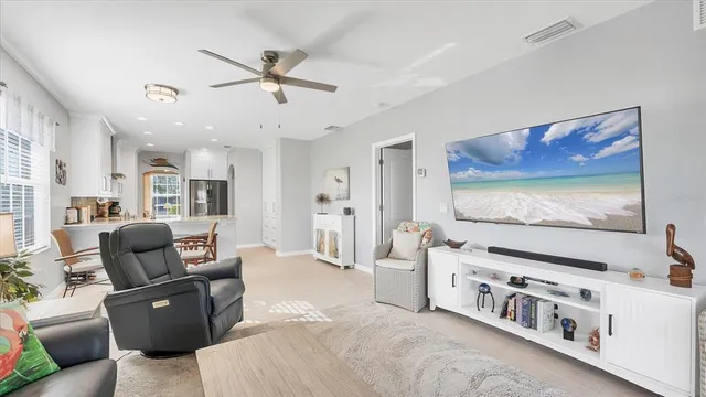 a bathroom with a sink toilet double vanity and shower