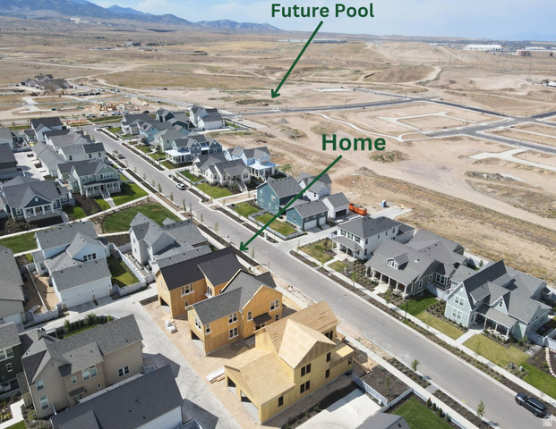 6709 Salt Marsh Road, Unit 448 South Jordan, UT 84009 - Photo 4 of 15 Newly constructed residential community featuring a variety of architectural styles, paved streets, and landscaped front yards