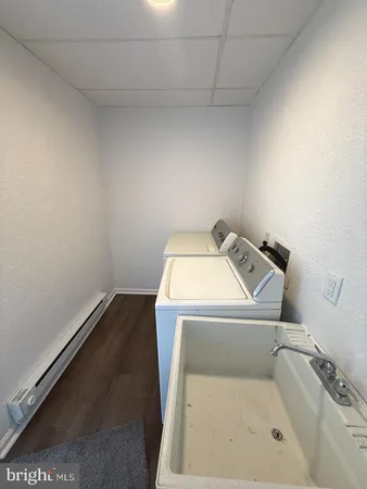 a view of a kitchen with a sink