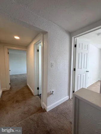 a bathroom with a sink a toilet and bathtub