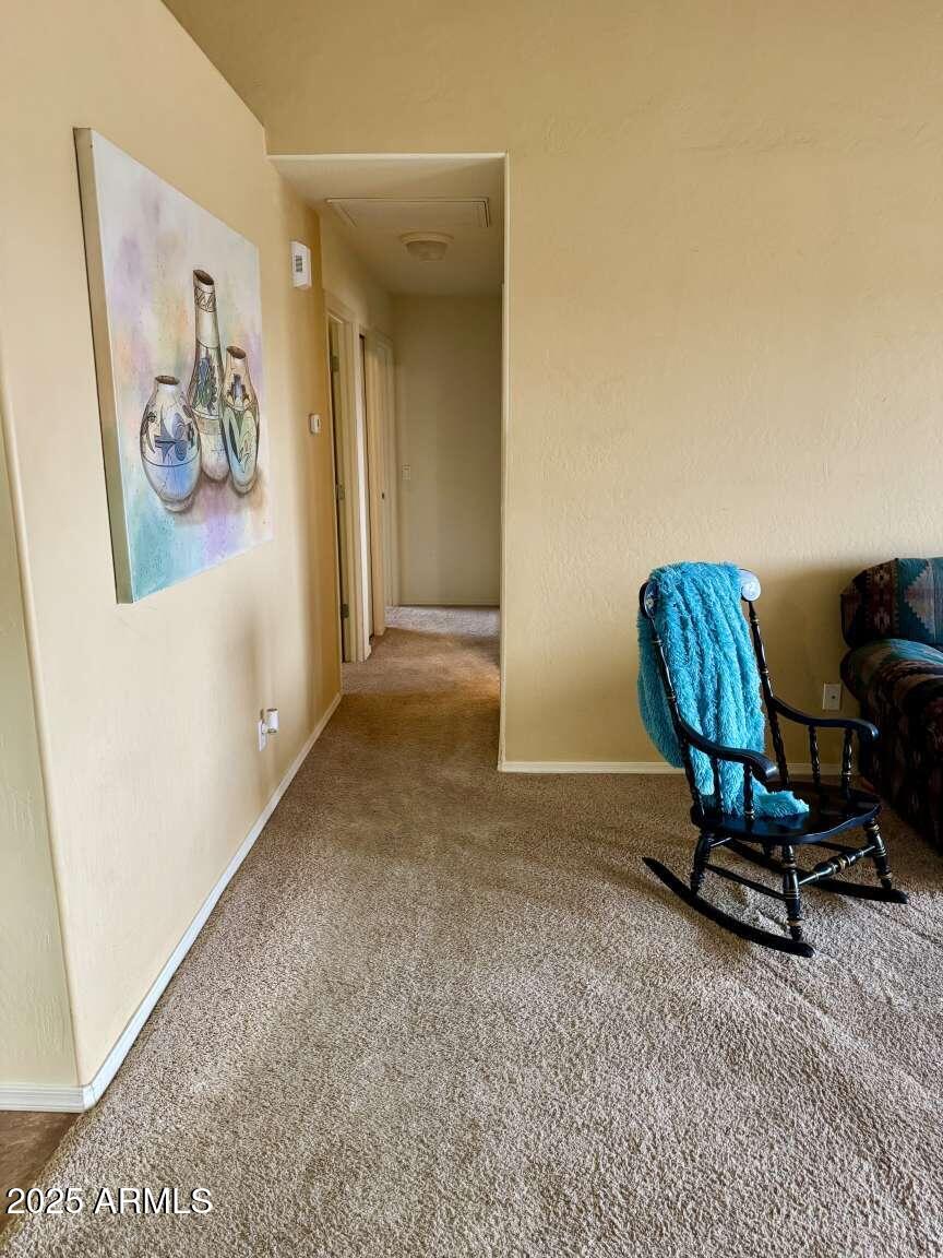 4660 Monument Way Rimrock, AZ 86335 - Photo 20 of 33 a living room with furniture and a refrigerator