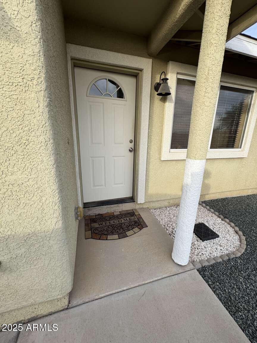 4660 Monument Way Rimrock, AZ 86335 - Photo 2 of 33 a bathroom with a granite countertop sink and a mirror