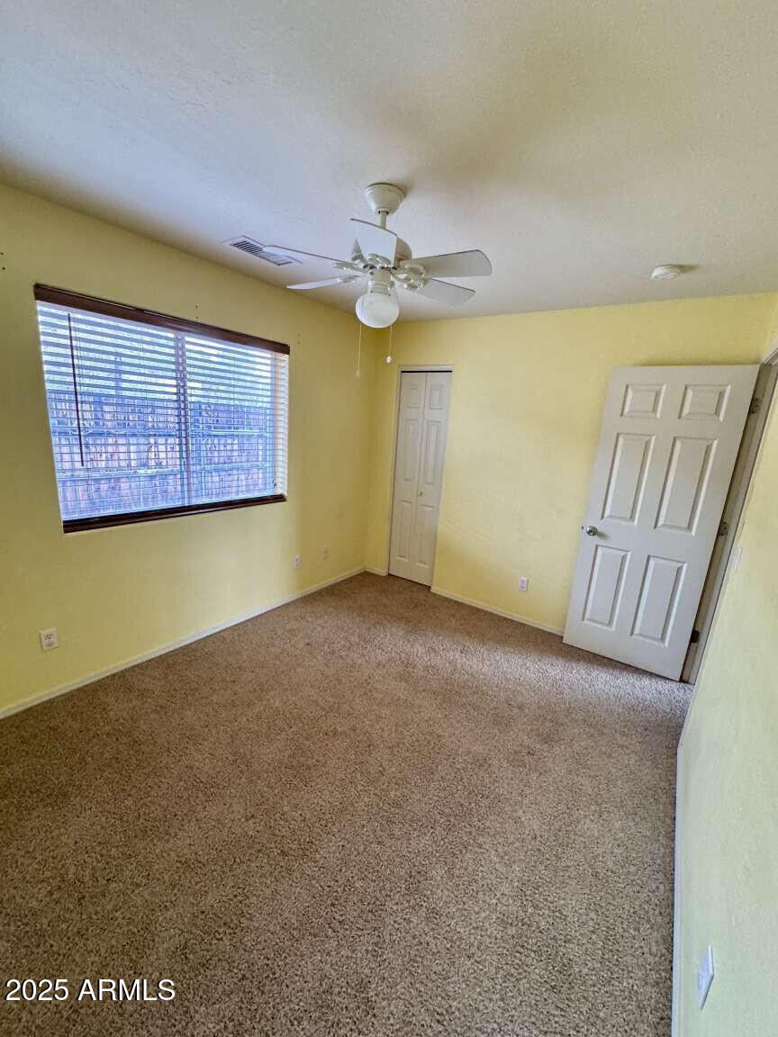 4660 Monument Way Rimrock, AZ 86335 - Photo 21 of 33 a view of an empty room with a window