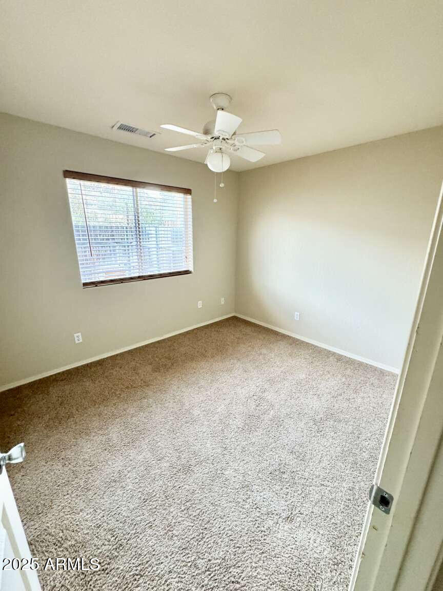 4660 Monument Way Rimrock, AZ 86335 - Photo 22 of 33 an empty room with a window