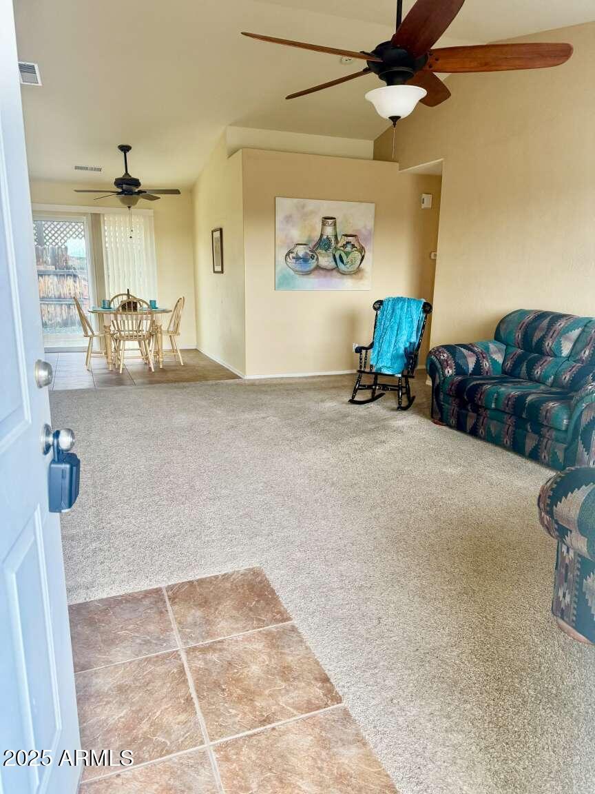4660 Monument Way Rimrock, AZ 86335 - Photo 4 of 33 a view of a livingroom with furniture and a ceiling fan