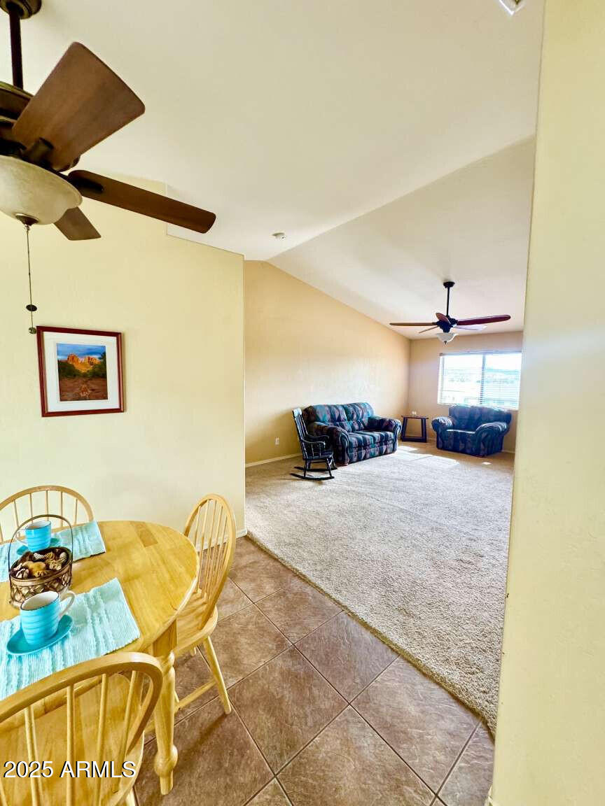 4660 Monument Way Rimrock, AZ 86335 - Photo 9 of 33 a bedroom with a bed and a painting on the wall