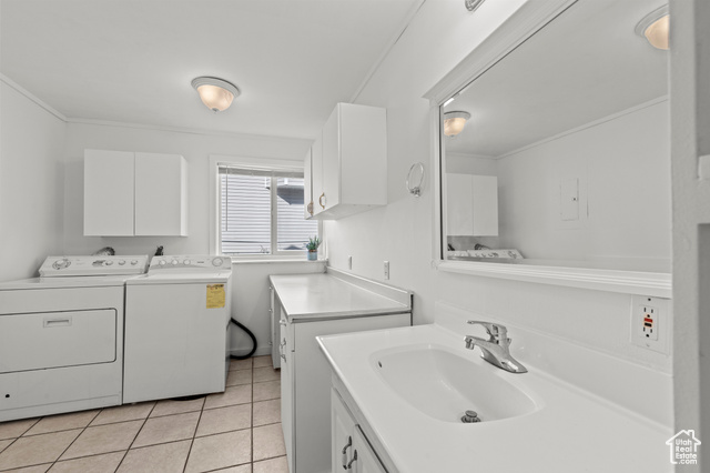 1099 Three Point Avenue Logan, UT 84321 - Photo 18 of 27 Laundry room with independent washer and dryer, light tile patterned floors, and ornamental molding