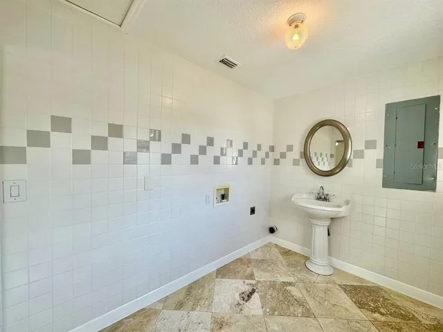 a view of a hallway with elevator