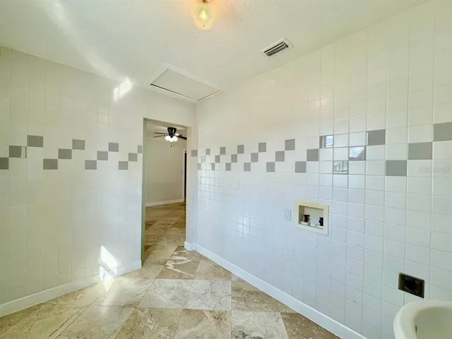 a view of a bathroom with a shower