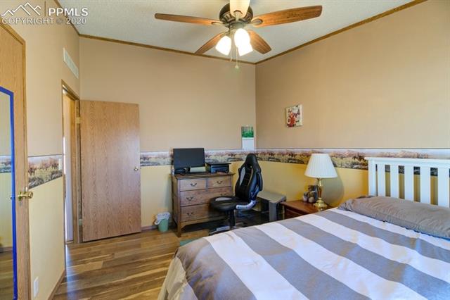5705 South Yoder Road Yoder, CO 80864 - Photo 28 of 42 Guest bedroom #1
