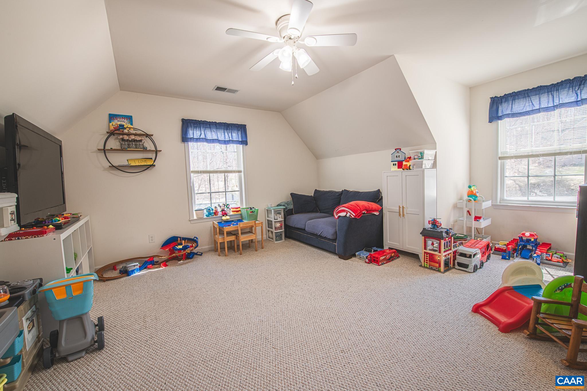 116 Riverside Drive Palmyra, VA 22963 - Photo 21 of 31 a children room with toys and a flat screen tv