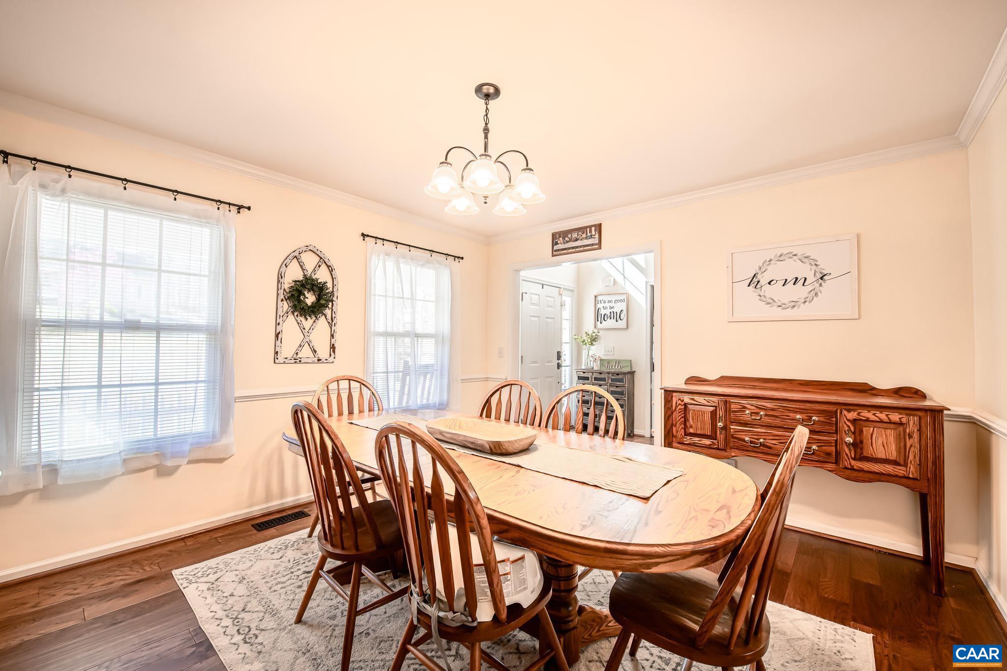 116 Riverside Drive Palmyra, VA 22963 - Photo 3 of 31 a view of a dining room with furniture window and wooden floor