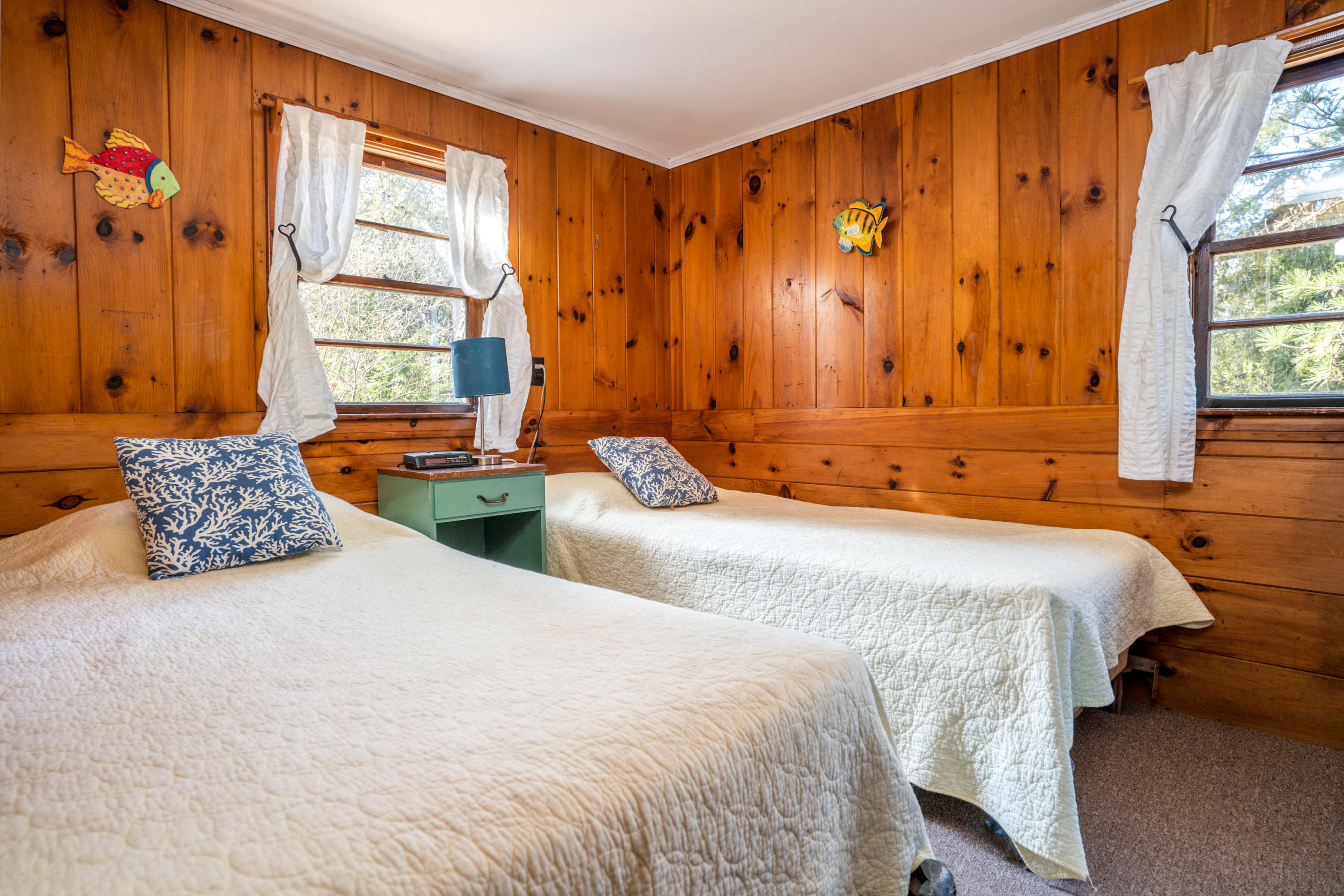 15 Massasoit Road Wellfleet, MA 02667 - Photo 14 of 23 a bedroom with two beds and next to a window