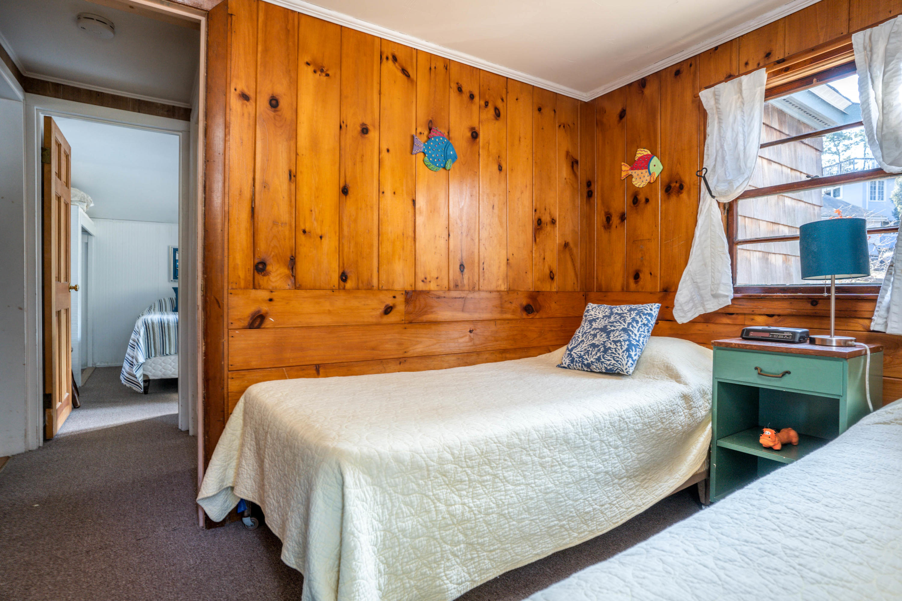 15 Massasoit Road Wellfleet, MA 02667 - Photo 15 of 23 a bedroom with a bed and a window