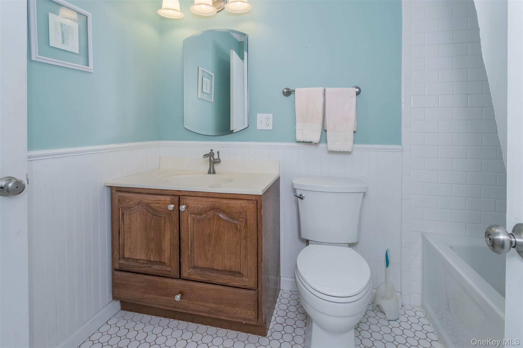 9 Olde Wagon Road Warwick, NY 10990 - Photo 16 of 23 a bathroom with a toilet a sink and mirror