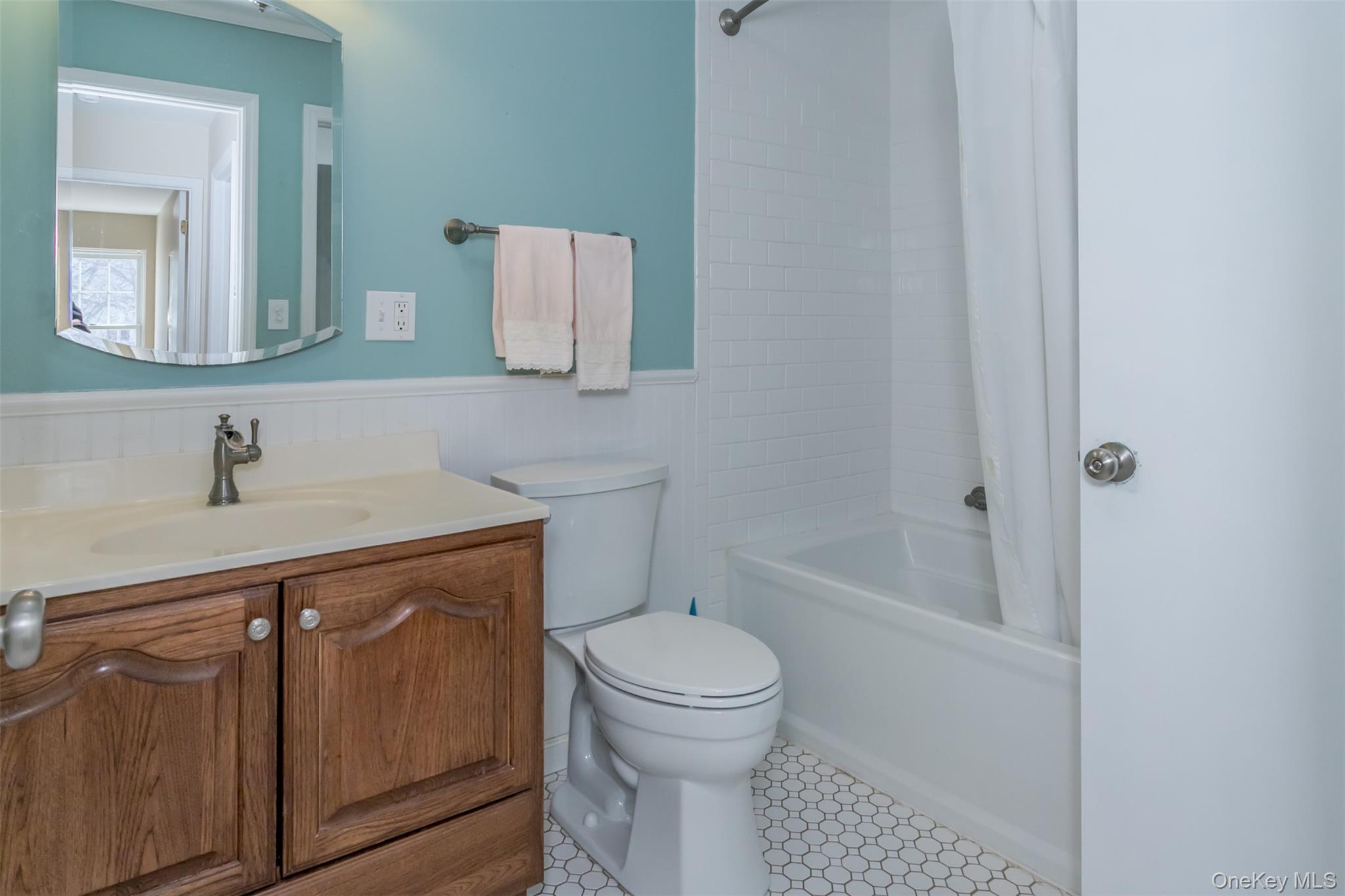 9 Olde Wagon Road Warwick, NY 10990 - Photo 17 of 23 a bathroom with a sink a toilet and shower