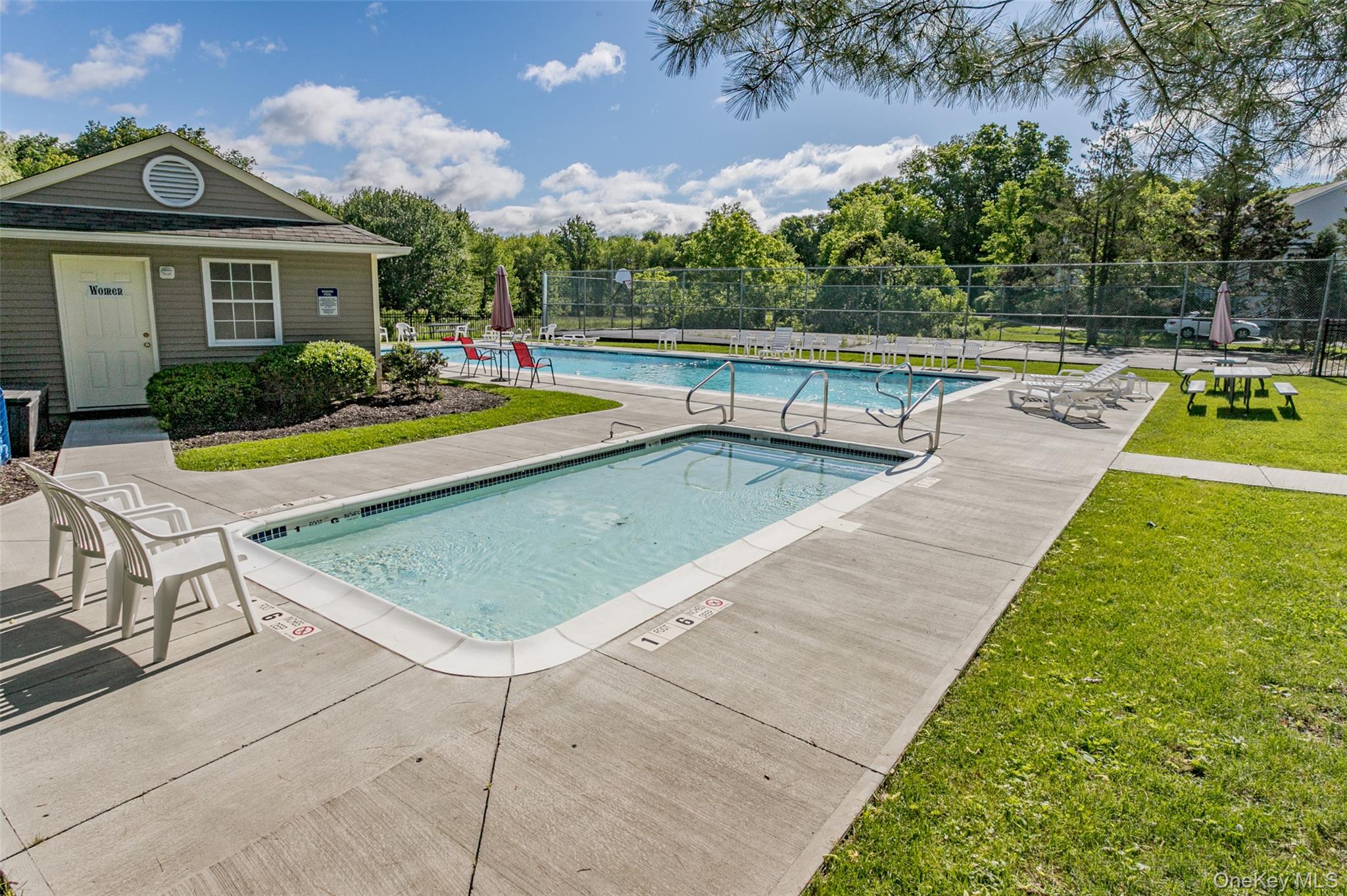 9 Olde Wagon Road Warwick, NY 10990 - Photo 22 of 23 a view of a house with swimming pool and chairs