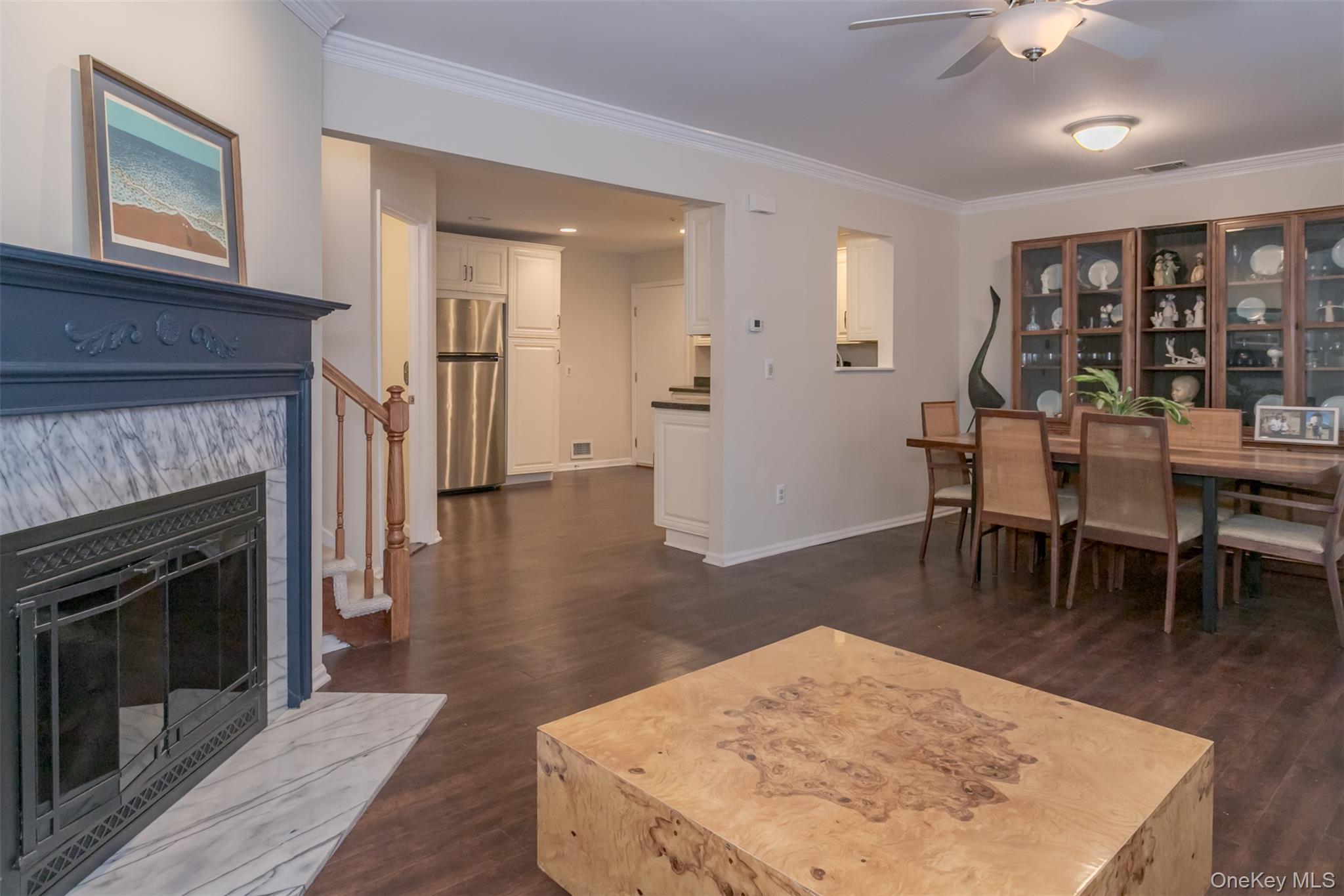 9 Olde Wagon Road Warwick, NY 10990 - Photo 3 of 23 a living room with furniture a fireplace and wooden floor