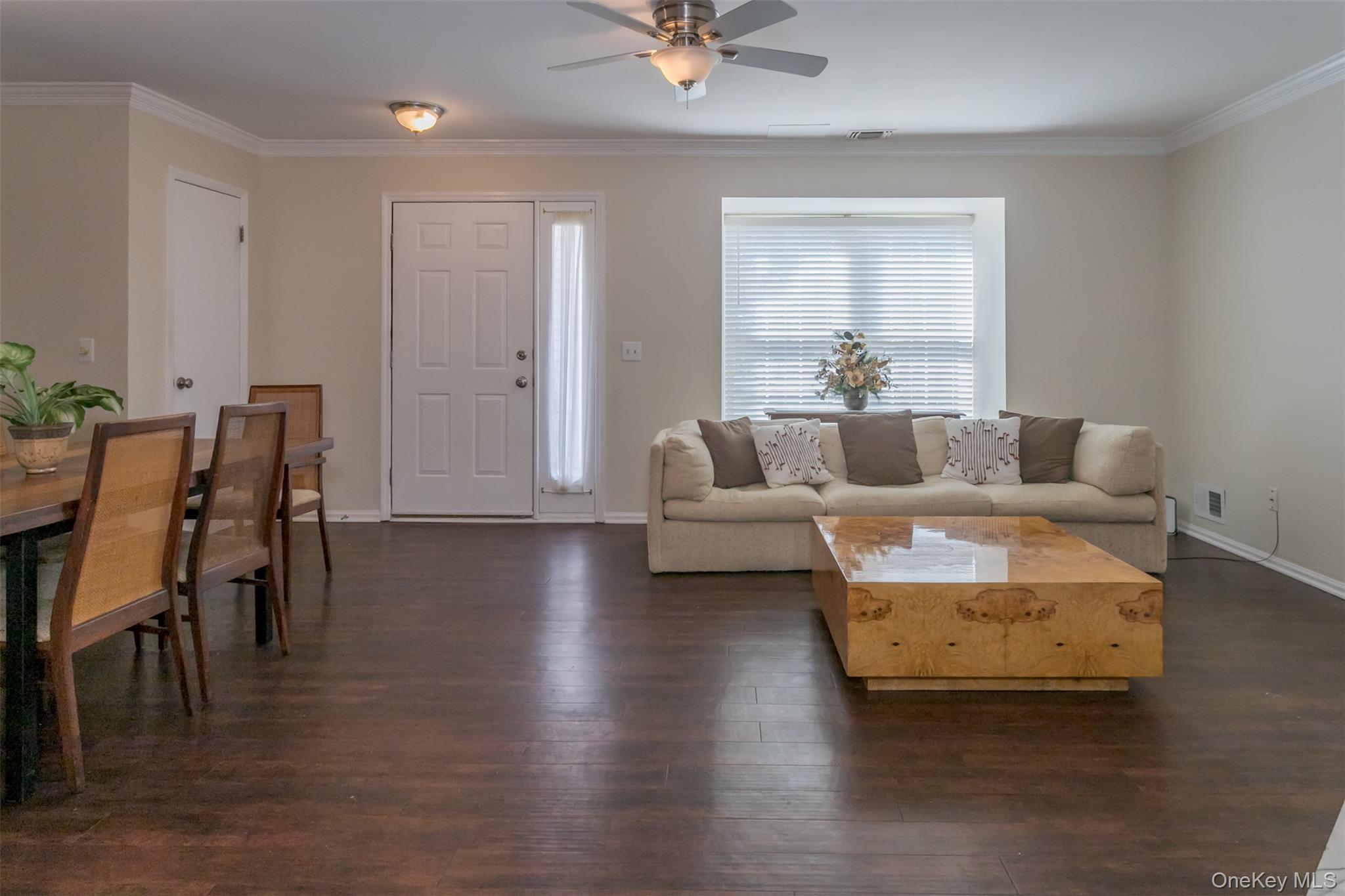 9 Olde Wagon Road Warwick, NY 10990 - Photo 4 of 23 a living room with furniture and a wooden floor