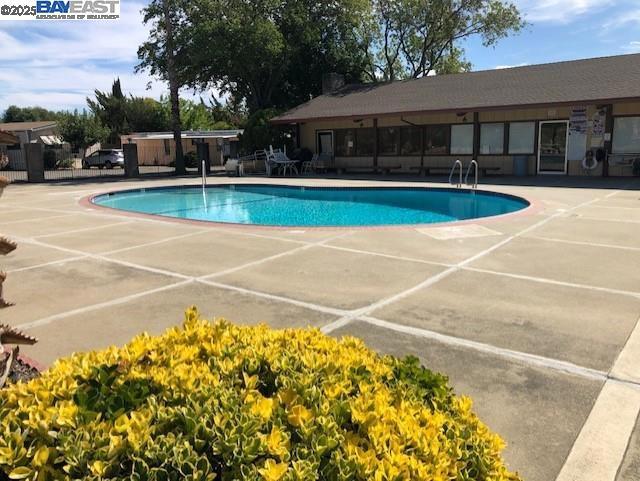 1382 Vía Deste Livermore, CA 94551 - Photo 21 of 21 a view of a swimming pool with a patio