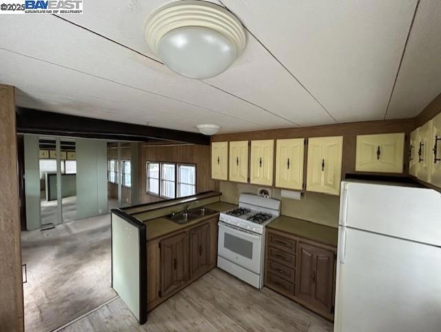 1382 Vía Deste Livermore, CA 94551 - Photo 5 of 21 a kitchen with a stove a sink and a refrigerator