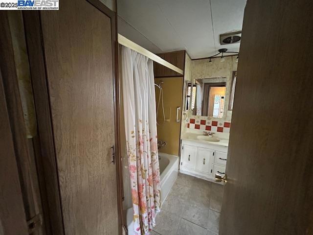 1382 Vía Deste Livermore, CA 94551 - Photo 10 of 21 a bathroom with a mirror sink and toilet
