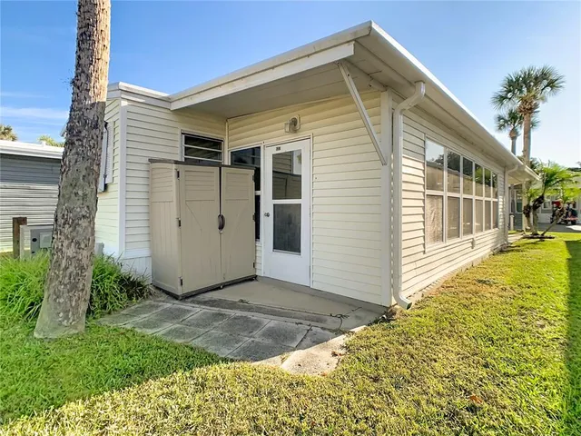 an aerial view of a house with a garden