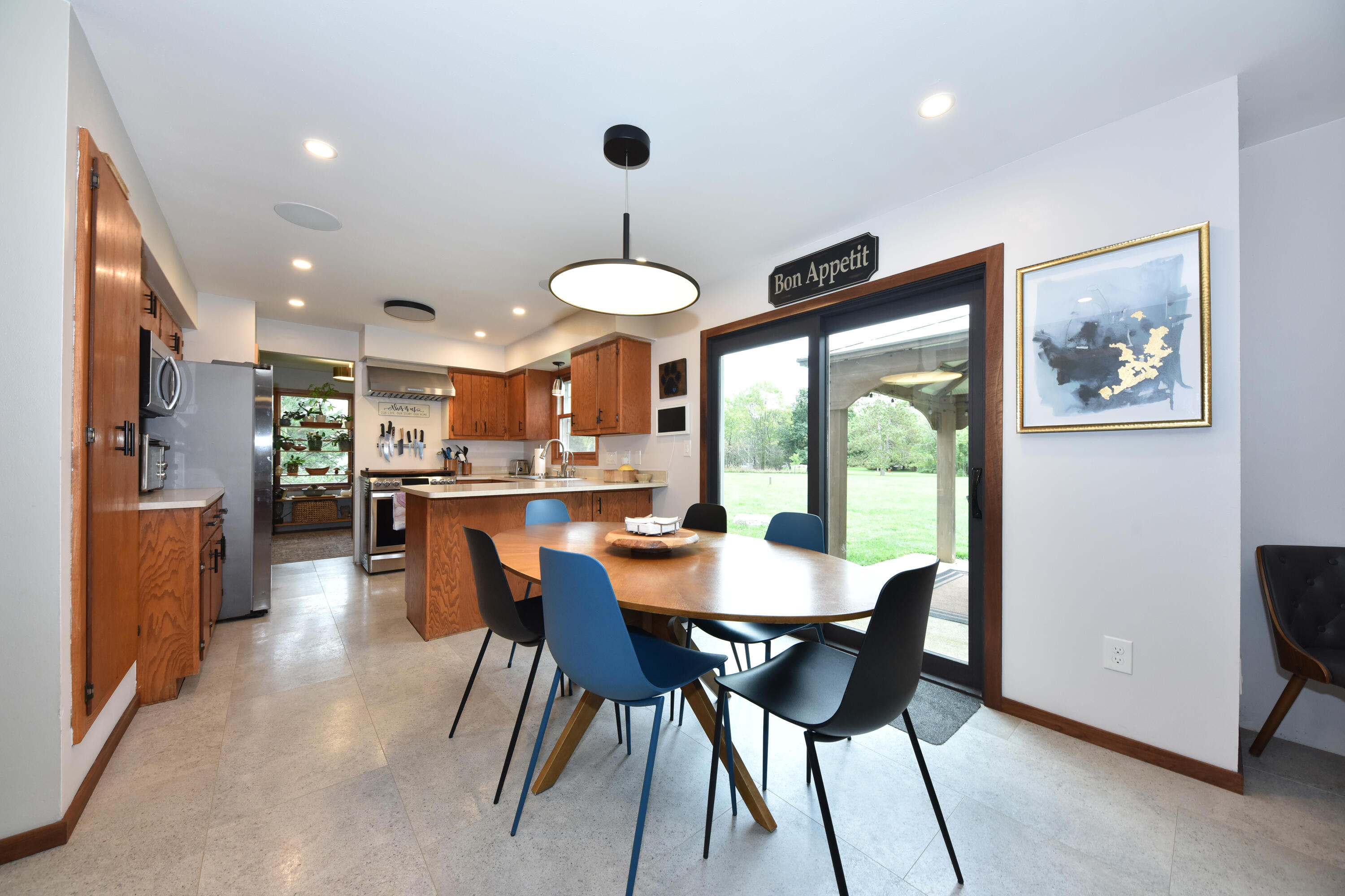 N67W33863 Loghouse Court Oconomowoc, WI 53066 - Photo 15 of 37 Great View into Kitchen