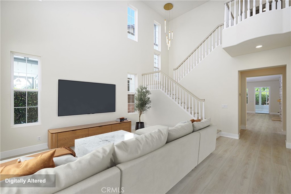 15 Plum Street Ladera Ranch, CA 92694 - Photo 16 of 113 a living room with furniture and a flat screen tv