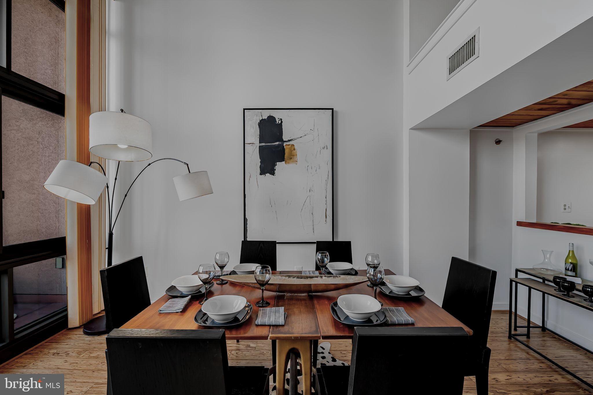 2901 Boston Street, Unit 204 Baltimore, MD 21224 - Photo 13 of 60 a view of a workspace with furniture