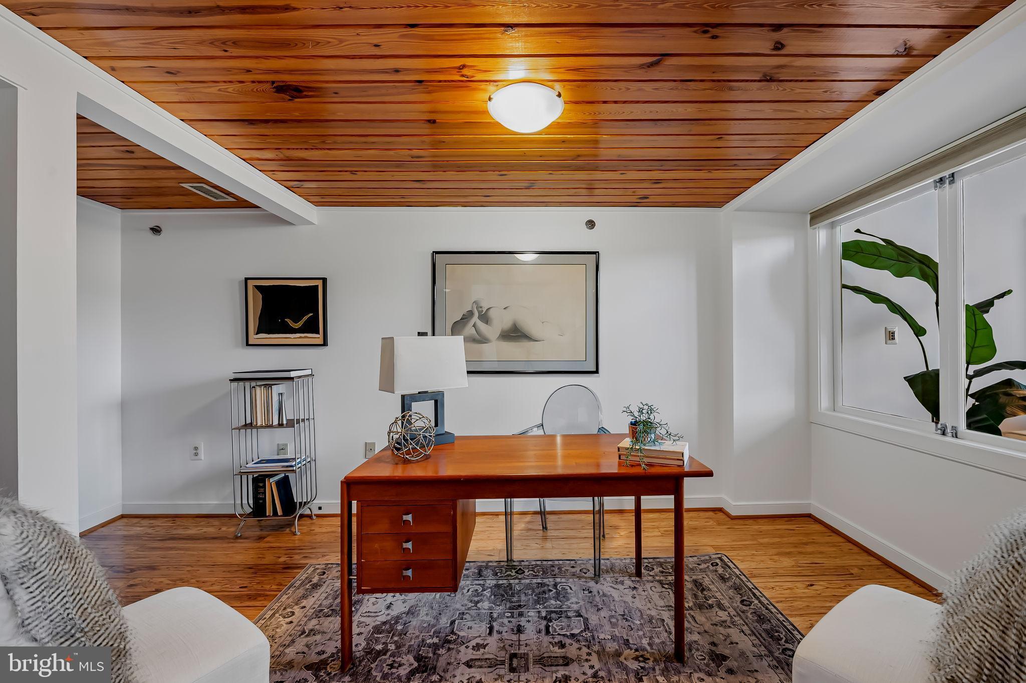 2901 Boston Street, Unit 204 Baltimore, MD 21224 - Photo 16 of 60 a living room with furniture