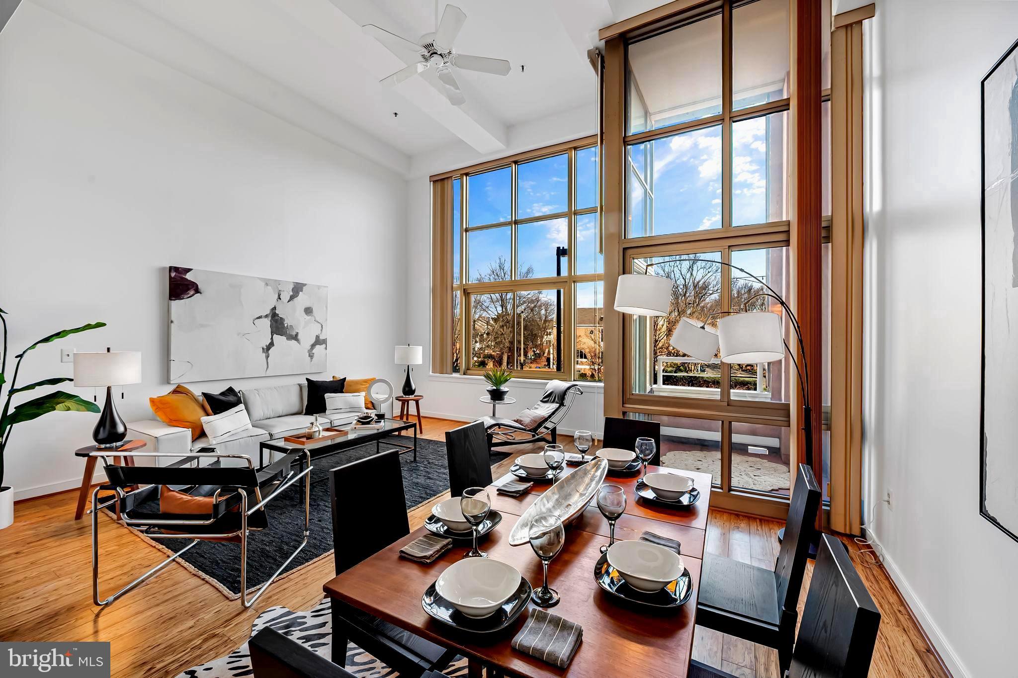 2901 Boston Street, Unit 204 Baltimore, MD 21224 - Photo 8 of 60 a room with furniture and a window