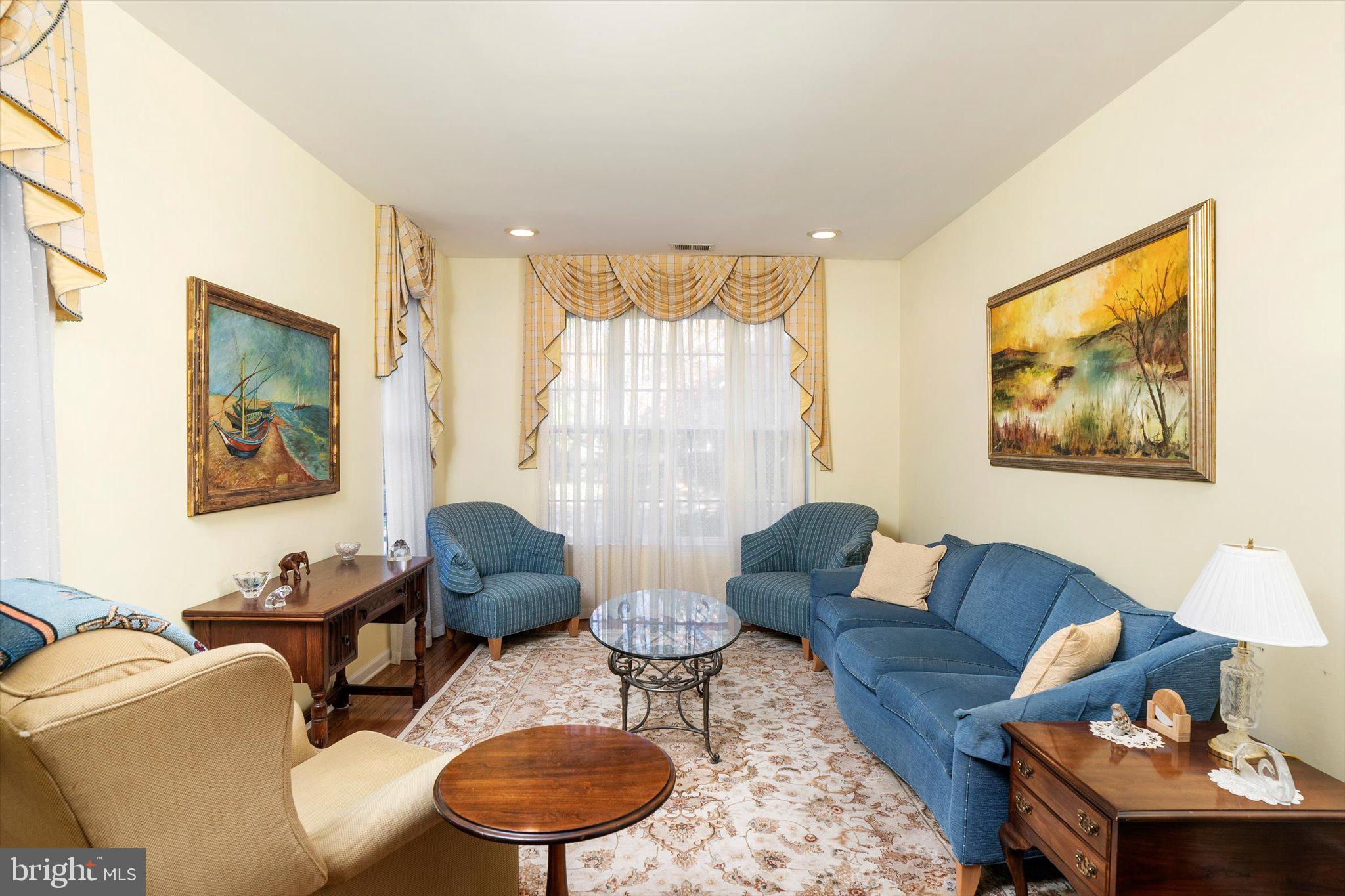 100 Jackson Avenue Princeton, NJ 08540 - Photo 12 of 33 a living room with furniture and a large window