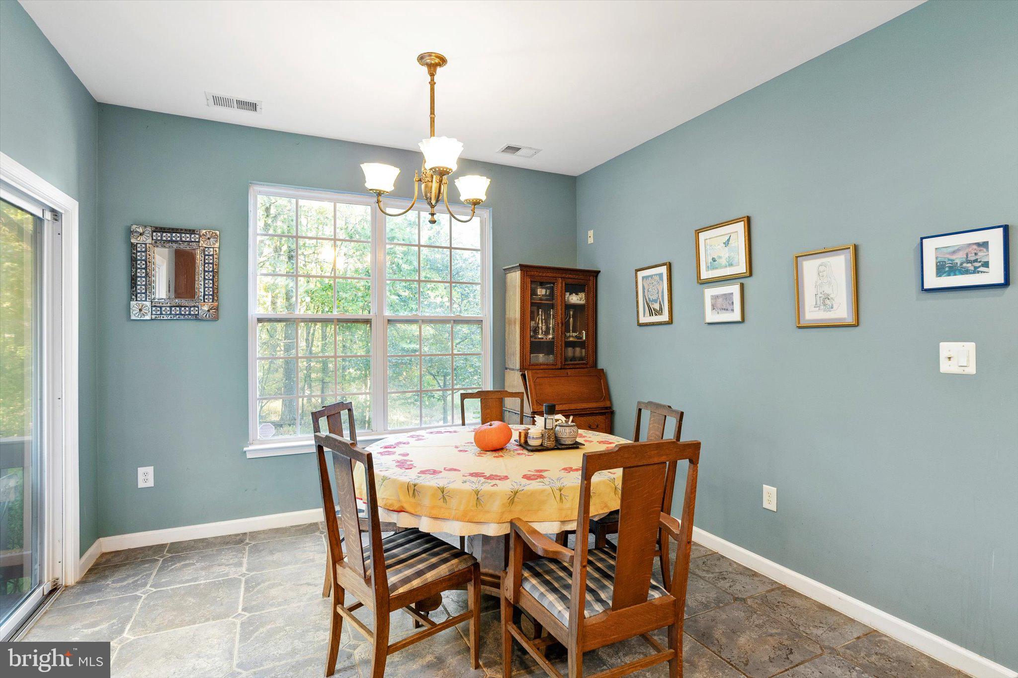 100 Jackson Avenue Princeton, NJ 08540 - Photo 10 of 33 a view of a dining room with furniture window and outside view
