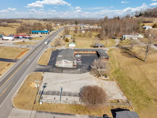 a view of a swimming pool with an ocean view