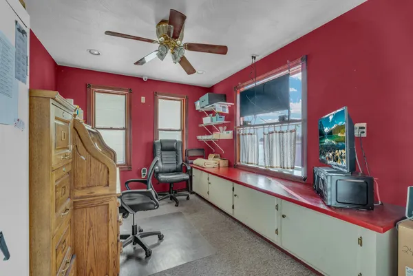 a view of a livingroom with furniture