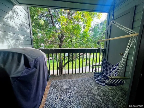 a view of a porch with a yard