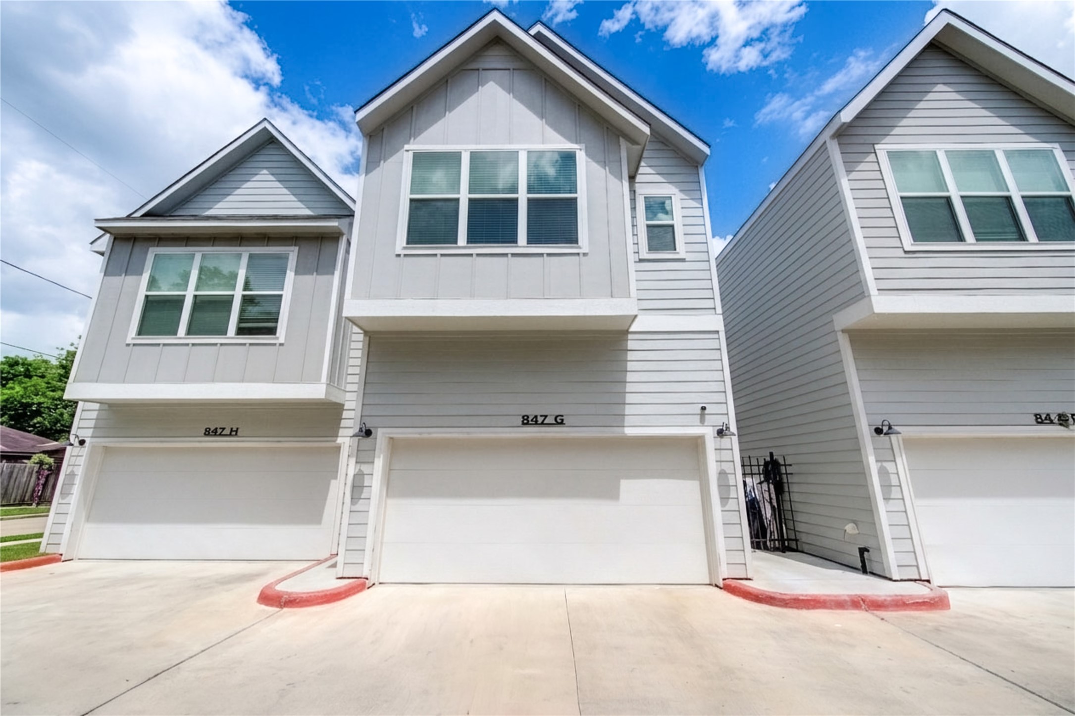 Unit separation with individual private entry and distinct exterior elevations between residences.