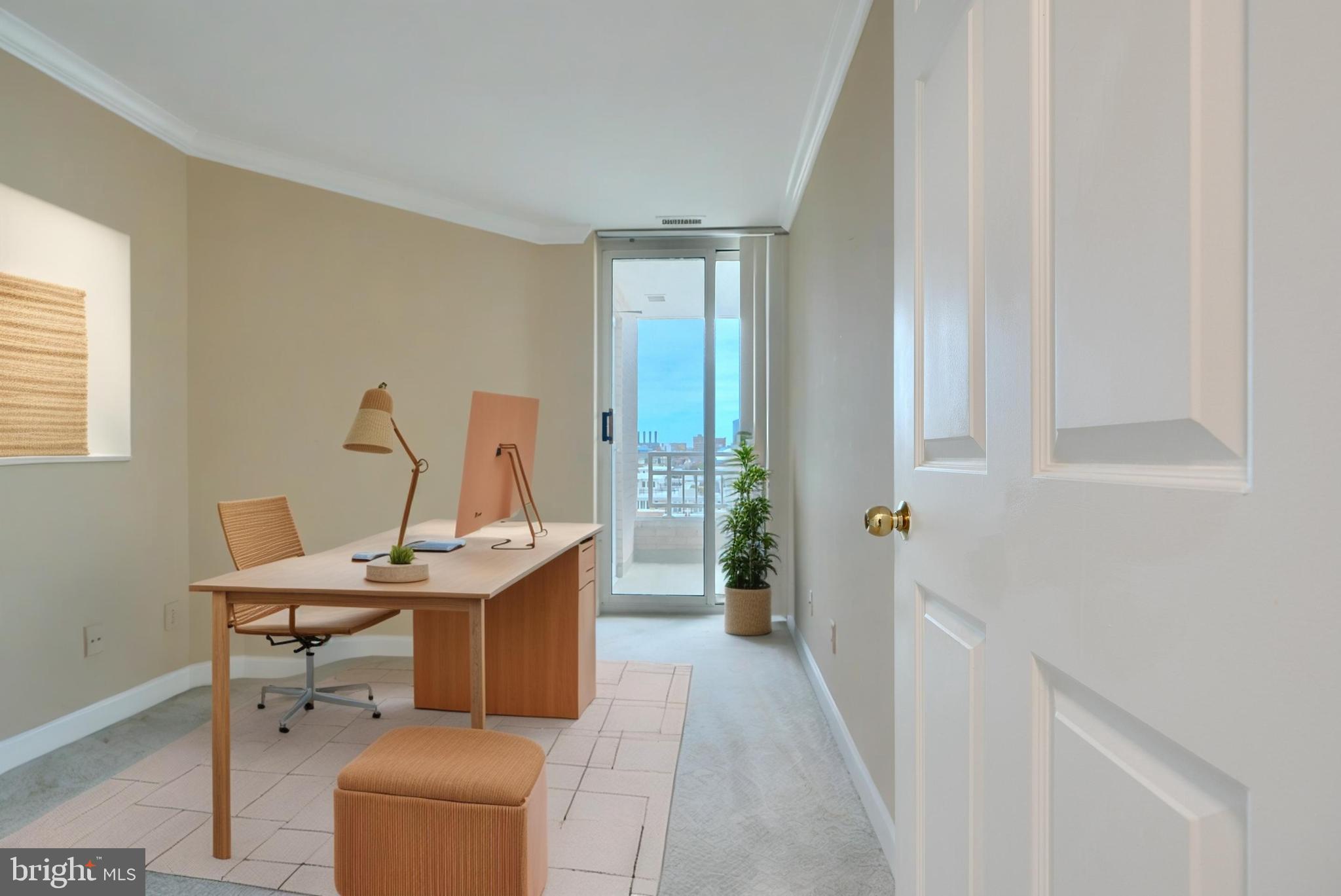 100 Harborview Drive, Unit 609 Baltimore, MD 21230 - Photo 17 of 45 a view of a workspace with furniture and a window