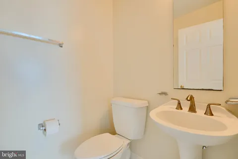 a bathroom with a double vanity sink and mirror