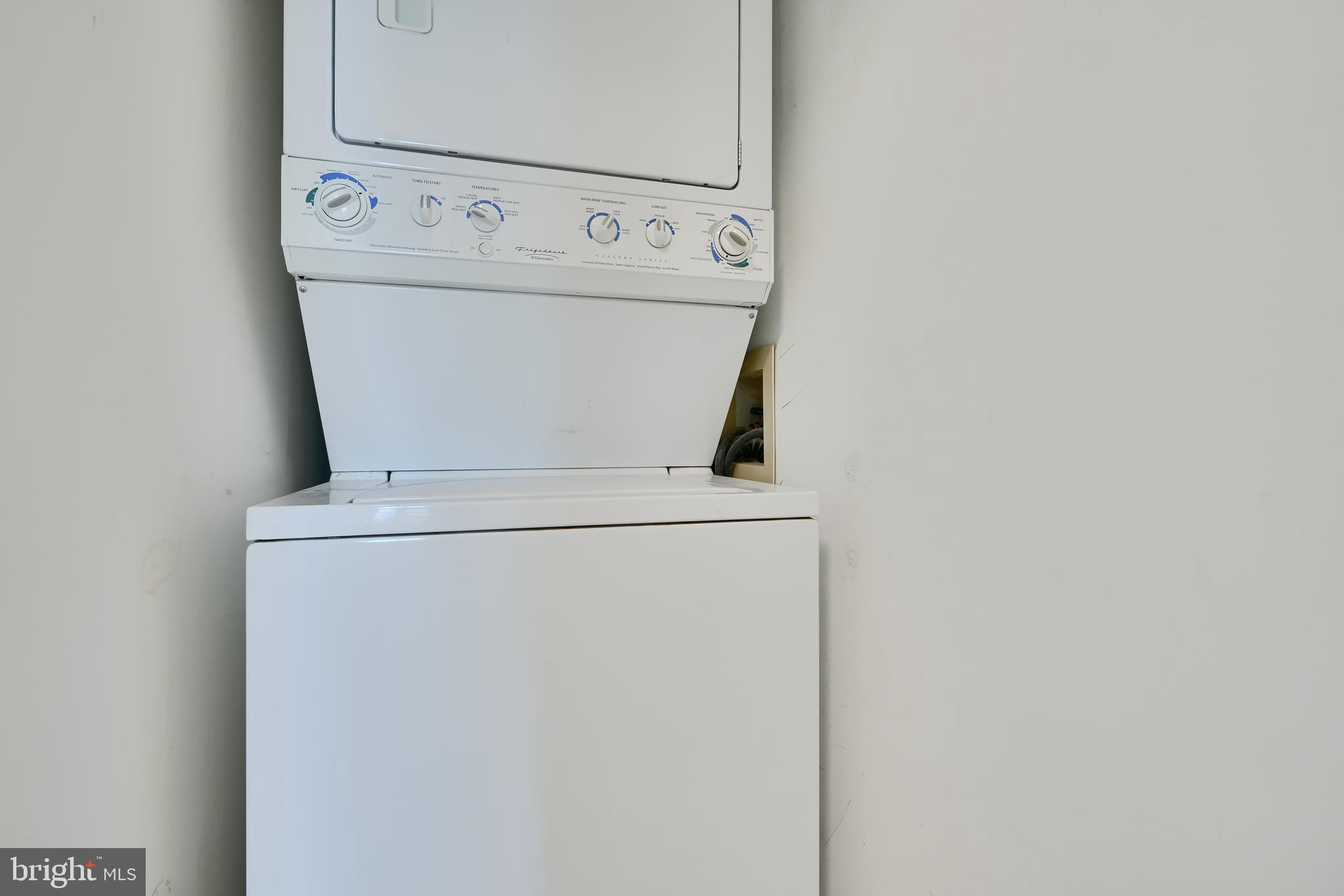 100 Harborview Drive, Unit 609 Baltimore, MD 21230 - Photo 24 of 45 a close up view of washer and dryer