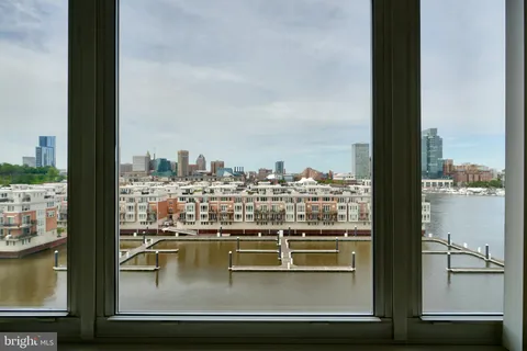 a view of a swimming pool with a chairs